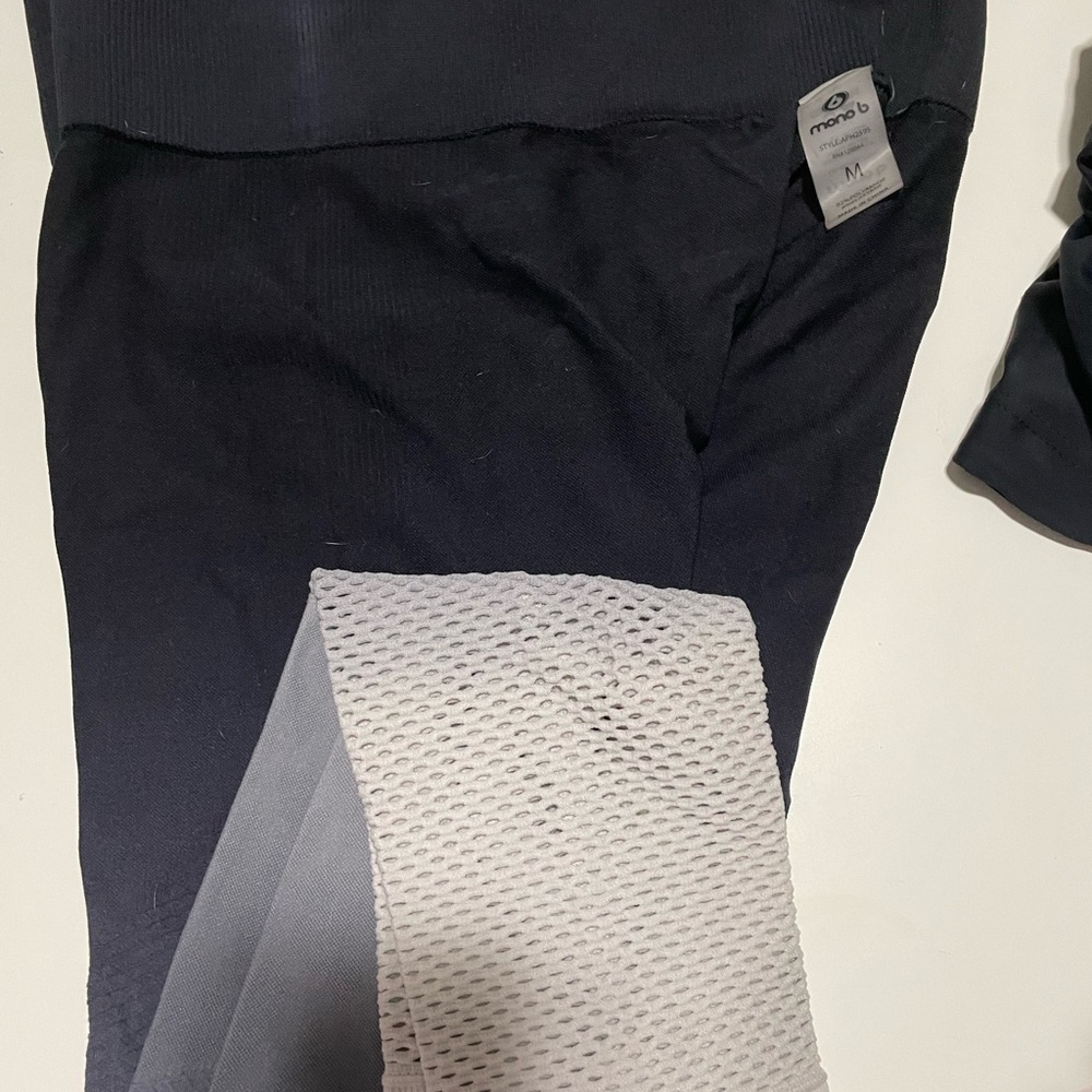 Mono b ombre leggings Size M with laser cuts at calf/ankle. Texture & design